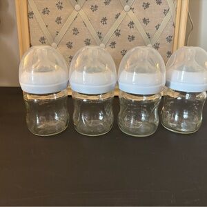Set of 4 Philips Avent glass bottles